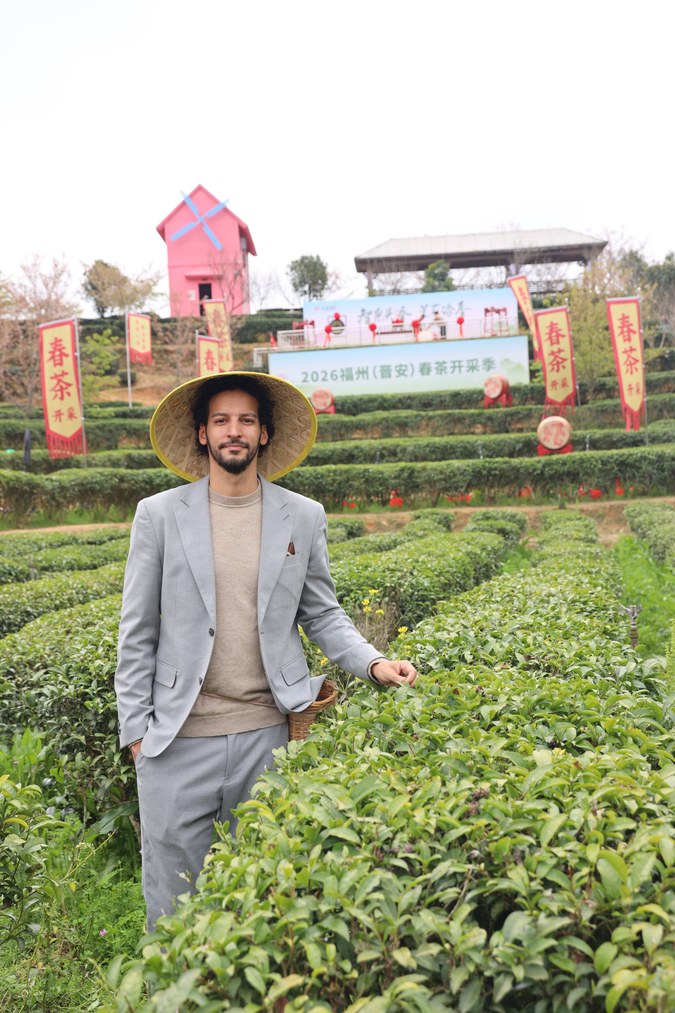 Ricky Ramos standing in a tea field in Fuzhou